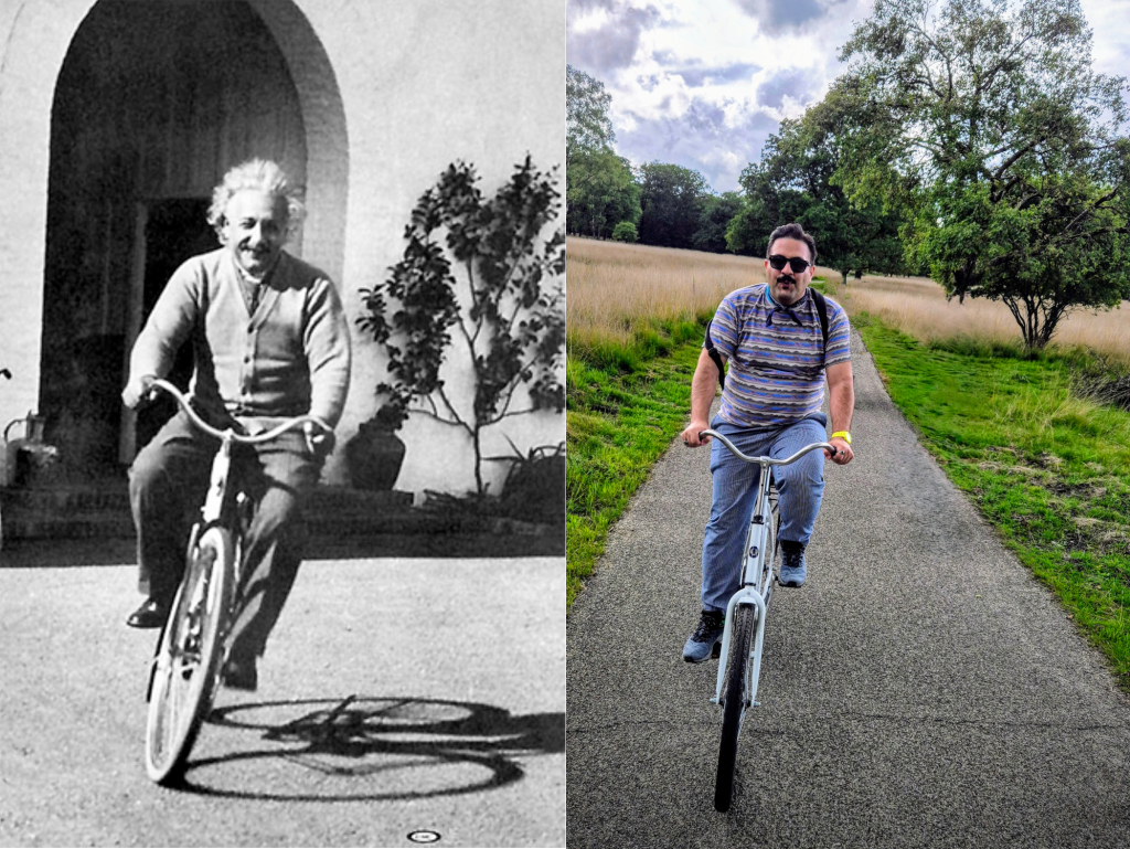 Two mustachioed men on wheels: one figured out relativity, and the other figured out snack time.